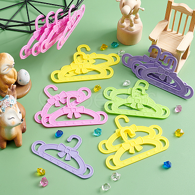 CHGCRAFT 40Pcs 4 Colors Bowknot & Star Pattern Plastic Doll Clothes Hangers DIY-CA0003-48-1