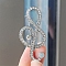 Alloy and Glass Rhinestone Musical Note Brooch, Clear, 64x32mm.